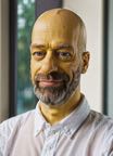 cinematic_photo_bald_man__yellow_painted_skin_and_head__male_focus__beard__close_up_on_face__funny_smile__white_shirt_40_y_o__homer_simpson_character_01_5____35mm_photograph__film__boke_3409274091.jpg