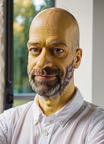 cinematic_photo_bald_man__yellow_painted_skin_and_head__male_focus__beard__close_up_on_face__funny_smile__white_shirt_40_y_o__homer_simpson_character_01_5____35mm_photograph__film__boke_3511819500.jpg