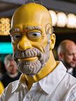 cinematic_photo_bald_man__yellow_painted_skin_and_head__male_focus__beard__close_up_on_face__funny_smile__white_shirt_40_y_o__homer_simpson_character_01_5____35mm_photograph__film__boke_2780558835.jpg