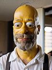 cinematic_photo_bald_man__yellow_painted_skin_and_head__male_focus__beard__close_up_on_face__funny_smile__white_shirt_40_y_o__homer_simpson_character_01_5____35mm_photograph__film__bokeh_593847574.jpg